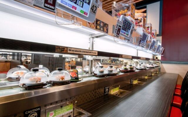 Dinner Arrives by Conveyor Belt at Kura in Jersey City, New Jersey