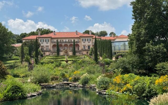 This 1920s Oilman’s Mansion in Tulsa Hides Hand-Carved Woodwork and Gardens Worth a Whole Afternoon