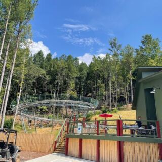 Riders Hit 40 MPH on This North Carolina Alpine Coaster Weaving Through the Blue Ridge Forest