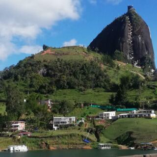 This Colombian Town Is Famous for Colorful Facades, Lakeside Scenery, and a Giant Rock