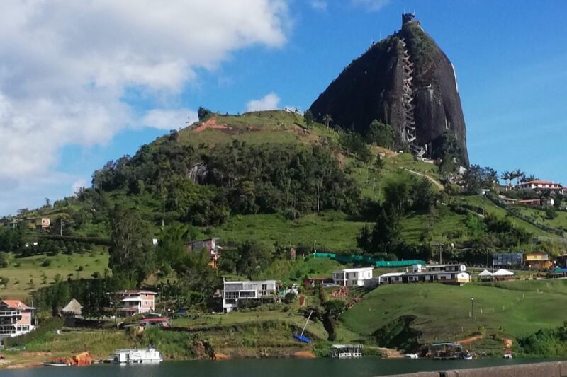 This Colombian Town Is Famous for Colorful Facades, Lakeside Scenery, and a Giant Rock