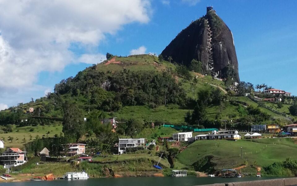 This Colombian Town Is Famous for Colorful Facades, Lakeside Scenery, and a Giant Rock