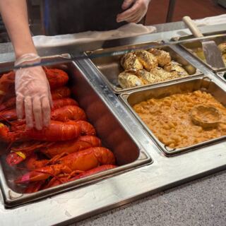 Steamed Lobster, Snow Crab Legs, and Local Oysters Are All Unlimited at This Lakeside Rhode Island Seafood Buffet