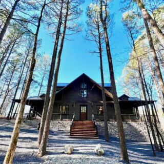 This Riverside Hideaway in Watson, Oklahoma Lets You Fish a Stocked Pond and Float the Mountain Fork