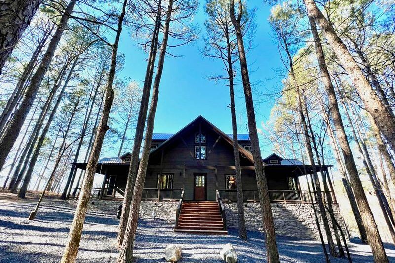 This Riverside Hideaway in Watson, Oklahoma Lets You Fish a Stocked Pond and Float the Mountain Fork