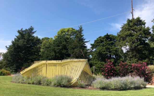 This Free Oklahoma Arboretum Turns A Fish Pond And Tree-Lined Trails Into A Metal Art Hunt
