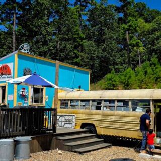 This Oklahoma Bar & Grill Near Broken Bow Serves Big Burgers And Cheesesteaks Inside An Old School Bus