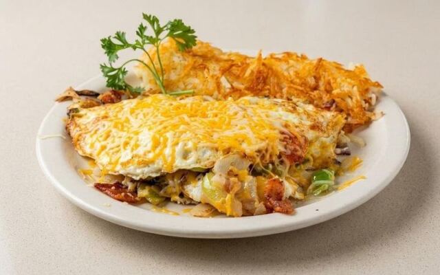 This Texas Diner Serves Its Skillet Combo In Very Large Portions With Homemade Salsa On The Side