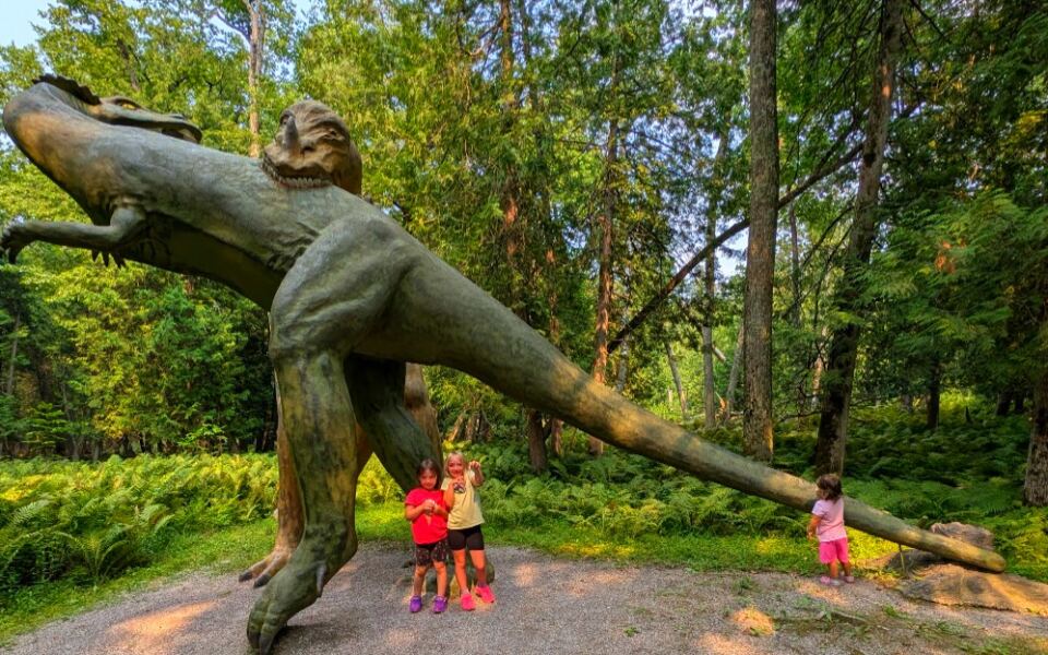 This Michigan Roadside Attraction Has Hidden Giant Dinosaurs in the Woods Since 1935