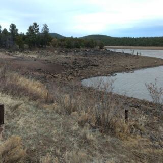 This Man-Made Arizona Reservoir Built in 1928 Draws Anglers and Campers, Even When Drought Leaves the Water Low
