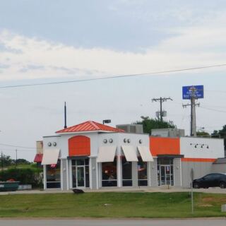 The Sign Is Faded, But There’s Usually A Line At This Oklahoma Donut Shop