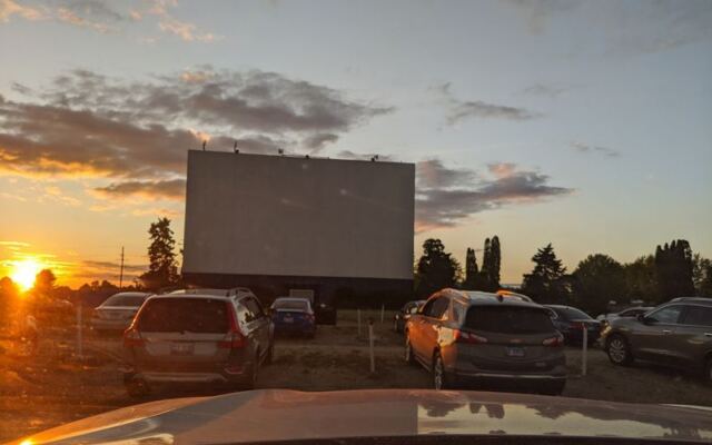 Cars Still Line Up At Dusk Under The Giant Screen Of This Northern Illinois Drive-In