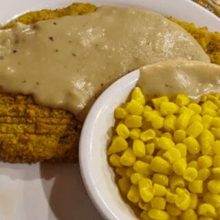 This Tennessee Log Cabin Restaurant Still Serves Country Fried Steak and Chicken and Dumplings Like Grandma Did