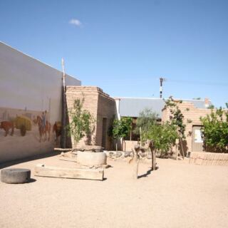 Older Than Arizona Itself, This City’s Turquoise Sidewalk Line Walks You From Its Spanish Fort Through Downtown