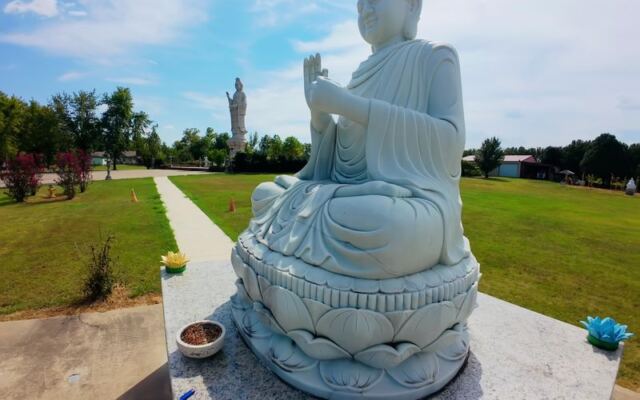 A Towering Stone Buddha Watches Over a Free Garden Hidden Behind This Quiet Tulsa Temple