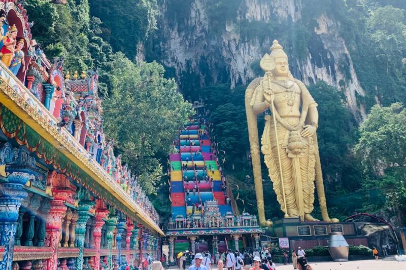 One of Malaysia’s Most Famous Sacred Sites Begins With 272 Colorful Steps Beneath a Giant Golden Statue